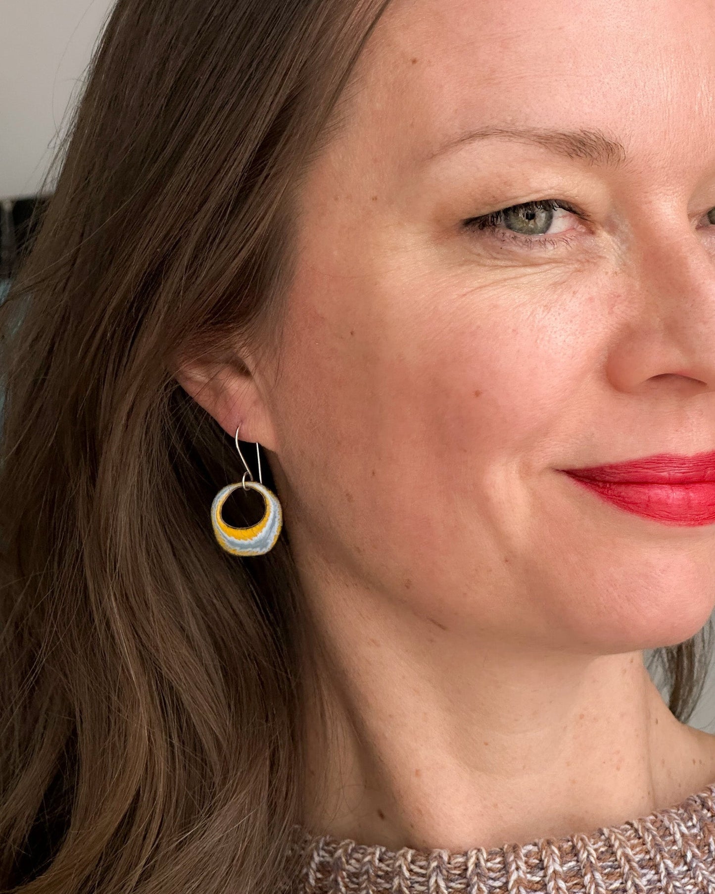 enamel batik earrings worn